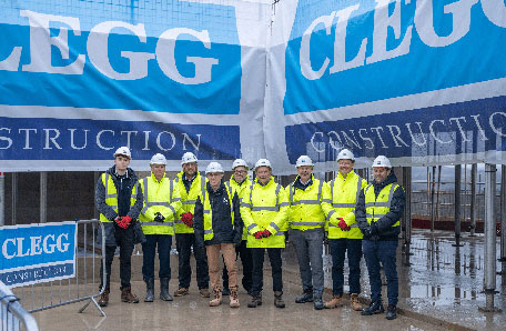 Clegg Construction stages topping out ceremony at apartment scheme in Leeds